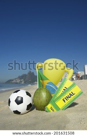 Brazil soccer champion trophy final tickets and coconut with football Ipanema Beach Rio de Janeiro Brazil