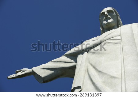 RIO DE JANEIRO, BRAZIL - MARCH 05, 2015: Close-up of the statue of Christ the Redeemer at Corcovado Mountain standing against blue sky.