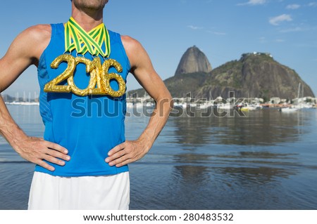 First place athlete wearing gold 2016 medals standing outdoors at Botafogo Bay Rio de Janeiro Brazil