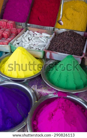 Colorful piles of Indian bindi powder dye at the local Devaraja outdoor Market in Mysore India