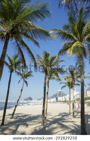 Copacabana Beach Rio de Janeiro view with palm tree shadows