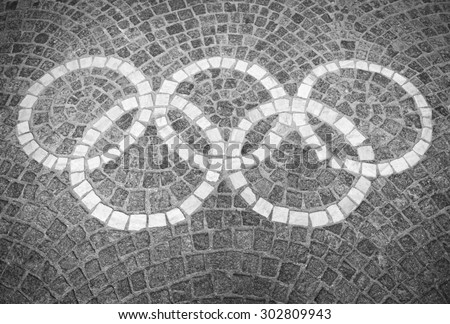 ROME, ITALY - JULY, 2012: Decorative Olympic rings logo set in stone blocks at the Foro Italico sports complex.