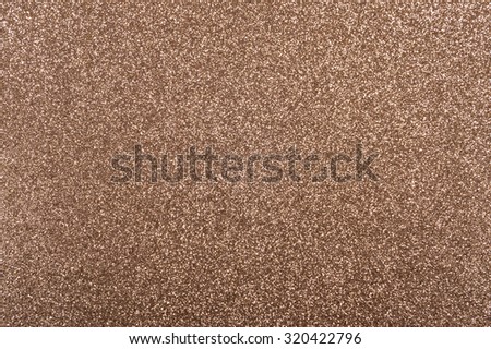 Bronze background with metallic glitter texture in full frame