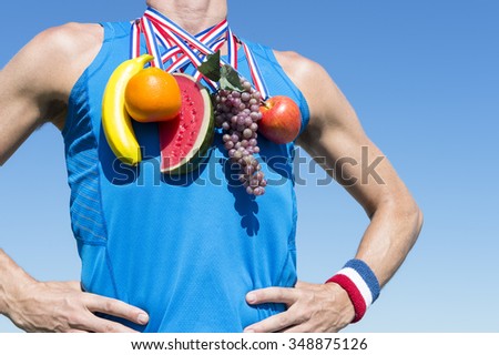 Winner of healthy eating competition standing at blue sky with fruit medals including banana, orange, watermelon, grapes, and apple