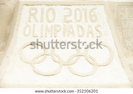 RIO DE JANEIRO, BRAZIL - OCTOBER 30, 2015: Rio 2016 Olimpiadas Olympic rings message designed in sand on Copacabana Beach in anticipation of the city hosting the Summer Games.