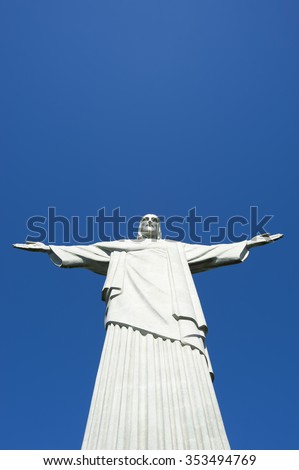 RIO DE JANEIRO - MARCH 05, 2015: Statue of Christ the Redeemer stands against clear blue sky on a clear day at the top of Corcovado Mountain.