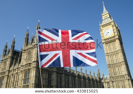 Great British Union Jack flag flying in front of Big Ben and the Houses of Parliament at Westminster Palace, London, in preparation for the Brexit EU referendum