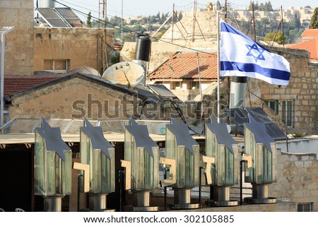 The Israeli flag and lights in the form of a Star of David on the square at the Wailing Wall in Jerusalem