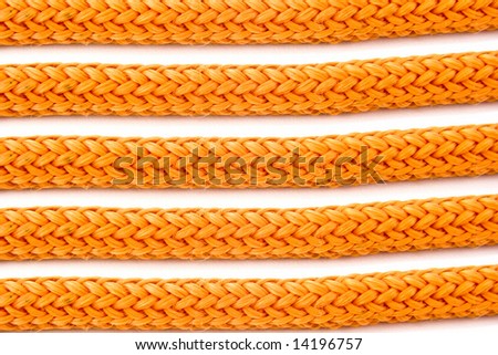 Parts of orange ropes isolated on white background