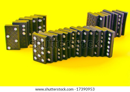 Dominoes isolated on yellow  background