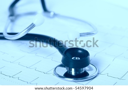 Stethoscope isolated on the cardiogram