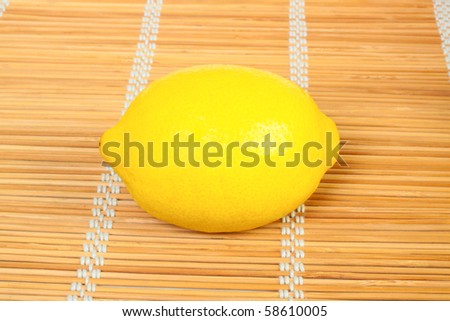 lemon isolated on a straw mat