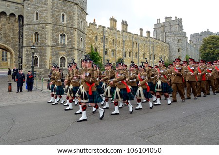 WINDSOR, BERKSHIRE, ENGLAND - MAY 19: Troops parading for Her Majesty the Queen outside Windsor Castle on Queens Diamond Jubilee Great Parade May 19, 2012 in Windsor, Berkshire, England.