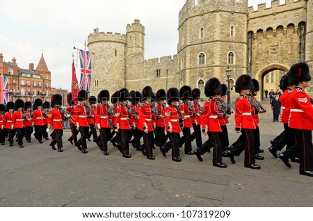 WINDSOR, BERKSHIRE, ENGLAND - MAY 19: Troops parading for Her Majesty the Queen outside Windsor Castle on Queens Diamond Jubilee Great Parade May 19, 2012 in Windsor, Berkshire, England.