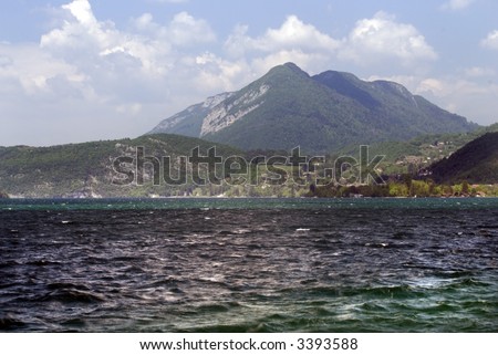 View of mountains from Lake Annecy France - landscape orientation