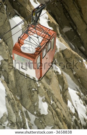 View of cable car from Aiguille Du Midi in Chamonix - portrait orientation