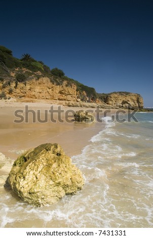 Oura Beach & cliffs in Albufeira, Portugal - portrait orientation
