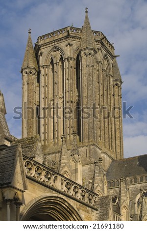 Church tower against blue sky in France
