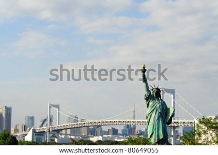 statue of Liberty and rainbow bridge in tokyo