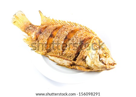 Deep Fried whole fish on white plate isolated