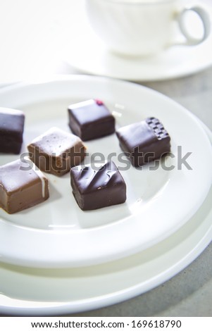 Handmade luxury chocolate on white plate