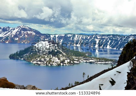 Wizard Island Covered with Snow on a Cloudy Early Summer Day, Crater Lake National Park