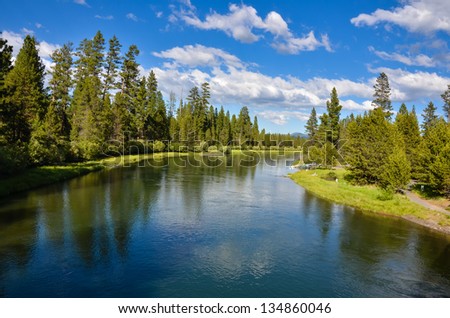 Beautiful River with Blue Sky Reflecting in Water