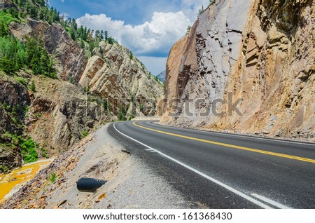A Twisty Mountain Road and Cloudy Sky