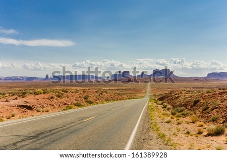 A Straight Desert Road Leading to Monument Valley, Arizona