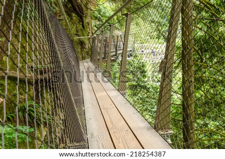 Narrow Wooden Cantilever Bridge