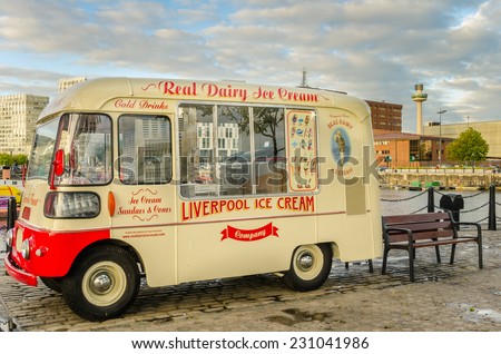 Liverpool, UK - October 1, 2014: Vintage ice cream van at Albert Dock. The Albert Dock is a major tourist attraction in the city and the most visited multi-use attraction in the UK, outside of London.