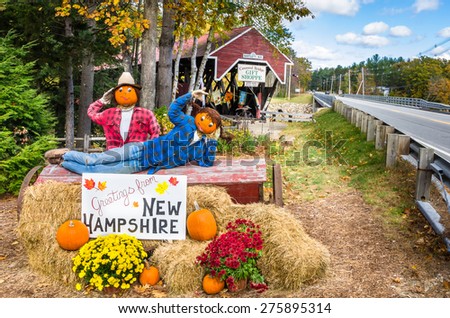 Bartlett, NH, USA - October 12, 2012: Halloween Decoration in Front of the Covered Bridge Gift Shoppe. The historic Bartlett Covered Bridge is one of 53 covered bridges left in New Hampshire.