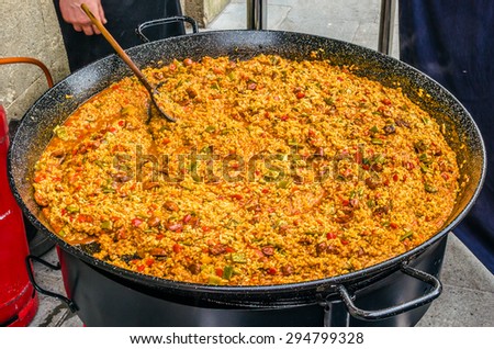Traditional Spanish Paella Being Cooked Outdoor