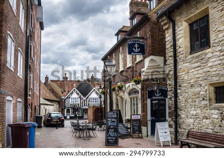 Poole, Uk - June 9, 2015: Traditional Pubs and Old Stone Buildings in the Historic City Centre. Poole is a large coastal town and seaport in the county of Dorset, on the south coast of England.