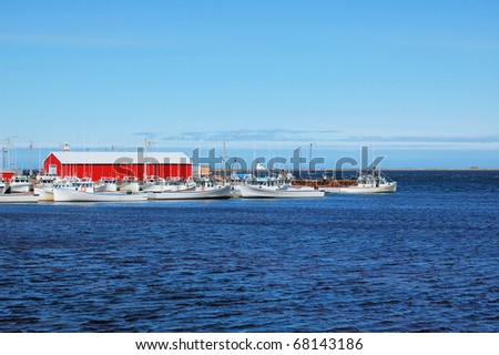 Fishing Boats At Small Wharf in Atlantic Canada