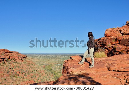 Young Woman Looking at a Beautiful Landscape