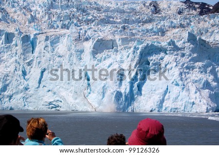 People Watching a Glacier Calving