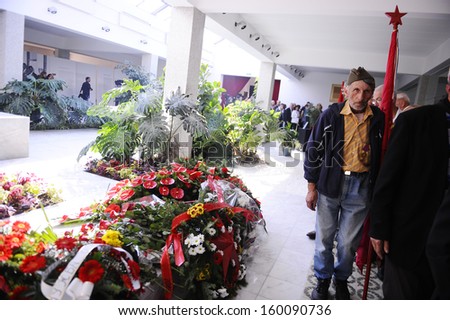 BELGRADE - OCTOBER 26: People passing by the grave of Jovanka Broz, former Yugoslavia\'s first lady\'s funeral in Belgrade, Serbia, October 26, 2013