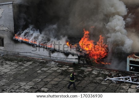 SERBIA, BELGRADE - MAY 25, 2012: Firefighters in action trying to control fire in \
