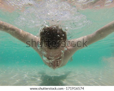 Young man snorkeling in Caribbean Sea, Varadero, Cuba. Cuba is known for having some of the best world\'s snorkeling spots.