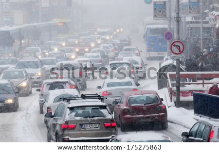 SERBIA, BELGRADE - FEBRUARY 3, 2012:  Traffic jammed and stuck in the city because of unexpected massive snowfall in Belgrade