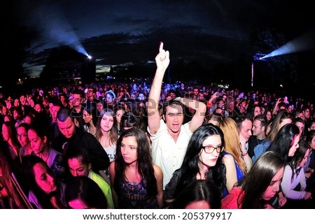 NOVI SAD, SERBIA - JULY 13, 2014: audience enjoy the show on Main Stage at the Best European Music Festival - EXIT 2014  at the Petrovaradin Fortress in Novi Sad