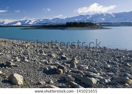 Island on Lake Pukaki, glacier water, low lake level, New Zealand