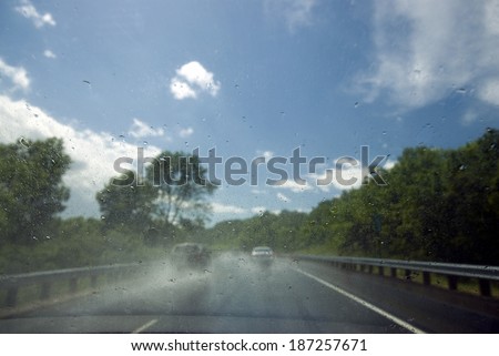 Rain on windscreen after rain storm on a sunny day