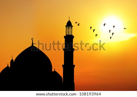 Silhouette of beautiful dome and minaret of mosque. shot at sunset 