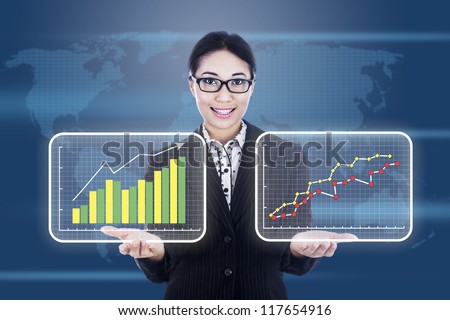 Businesswoman is presenting 2 different diagrams showing improvement or profit of a company