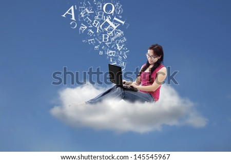 Asian female student send email message using laptop on cloud