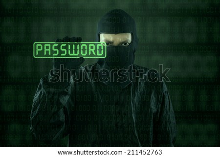 Hacker taking password from modern interface with dark background