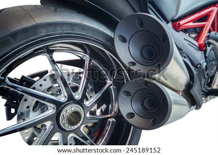 Closeup shot of black motorcycle exhaust pipes, isolated white background