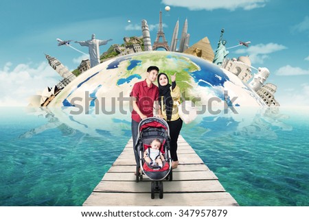 Concept of traveling around the world with family walking on the bridge at sea. Shot with famous landmarks background